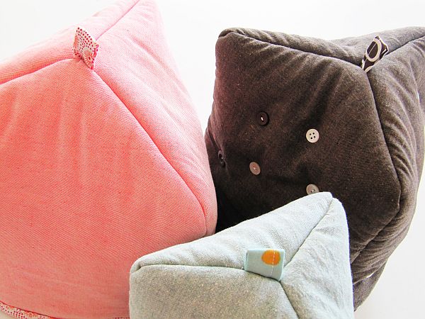 Kaffeewärmer in rosa, grün und braun